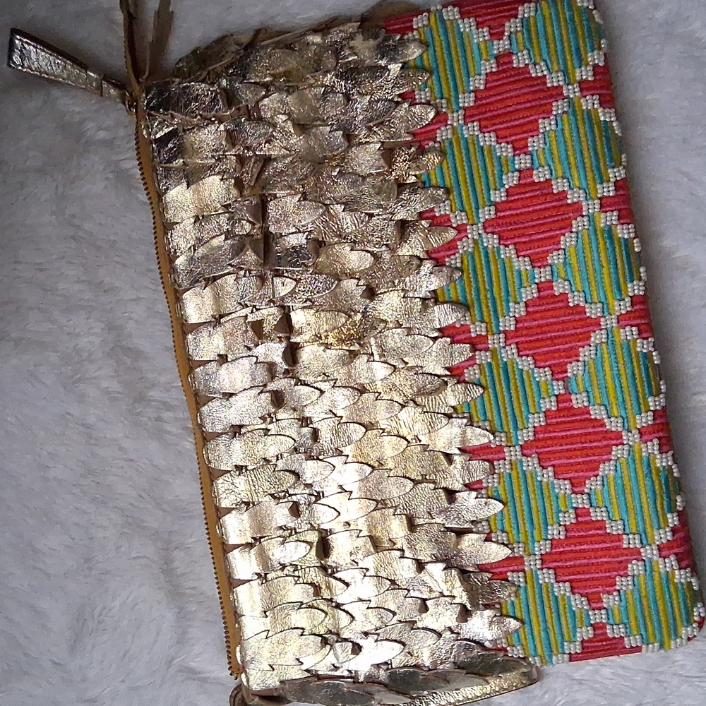 Jaspernthropologie beaded and leather clutch